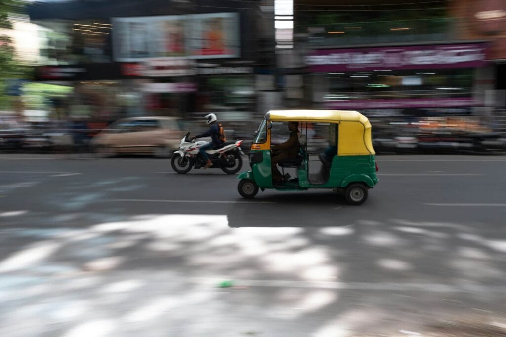 Auto rickshaw and train transportation in India