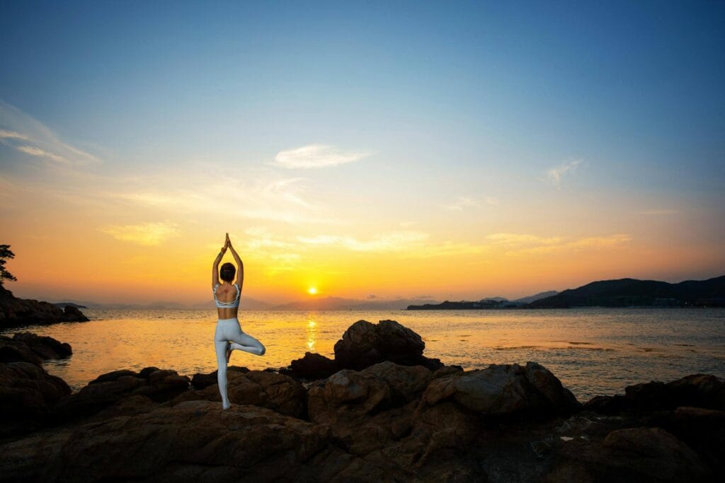 Peaceful yoga meditation at sunset India retreat