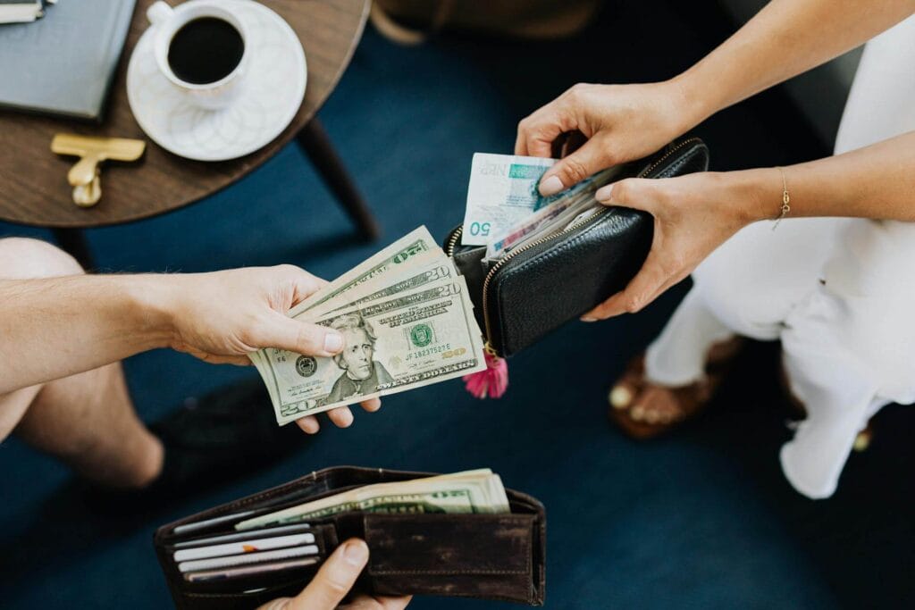 Tourist organizing cash and cards before traveling in India