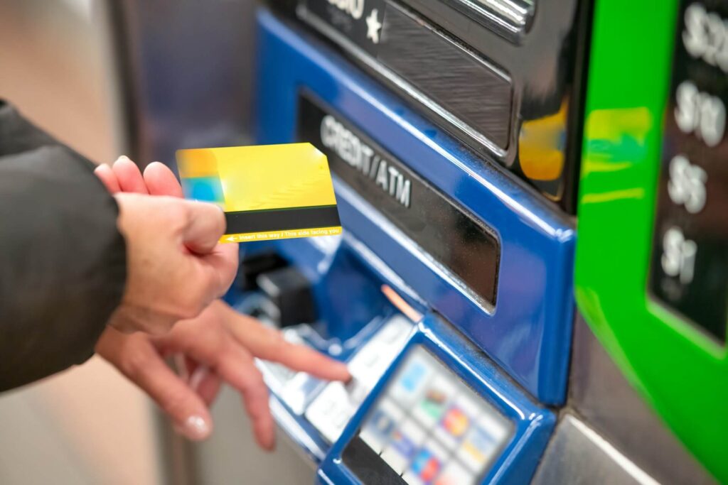 person using ATM