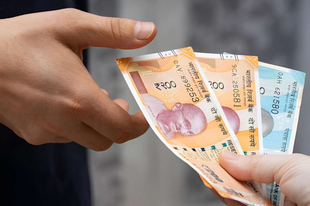 Tourist paying in India with cash