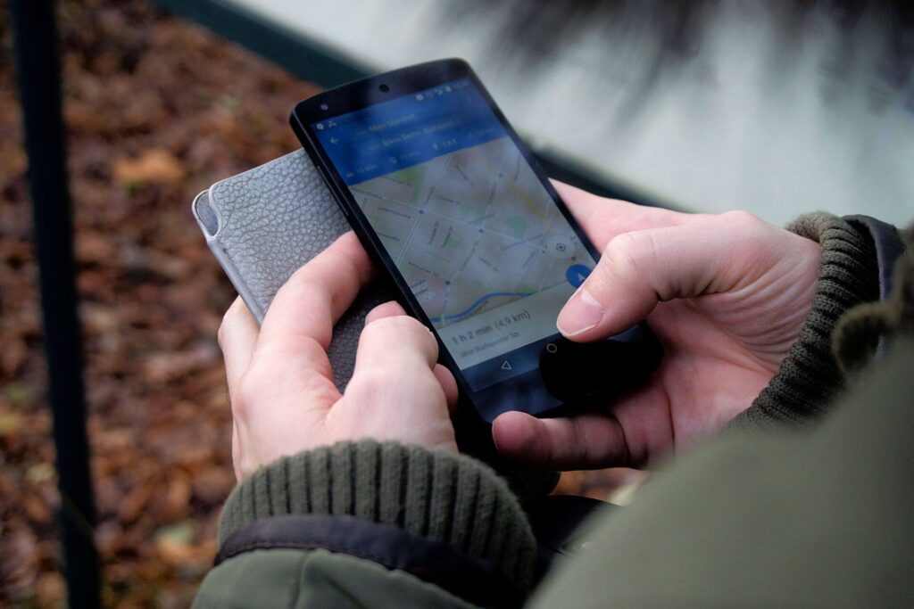 Traveler using a smartphone